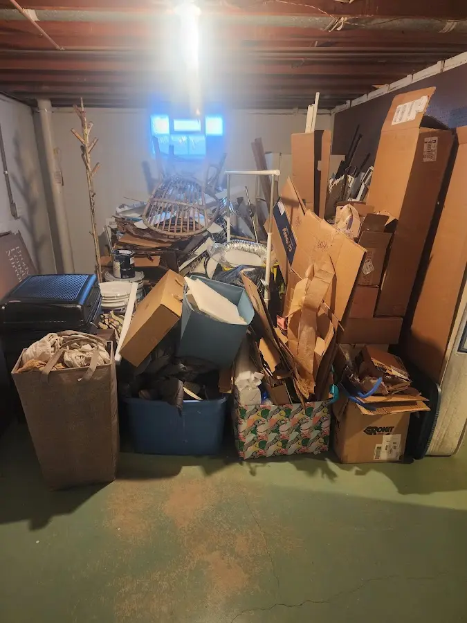 Roll-off dumpster container at job site for Construction Dumpster Rental in Port Jefferson